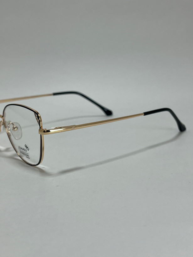 زاویه کناری فریم گربه ای فلزی عینک طبی زنانه جانی فریمن مدل اکو Johnny Freeman Eco مشکی طلایی شیک