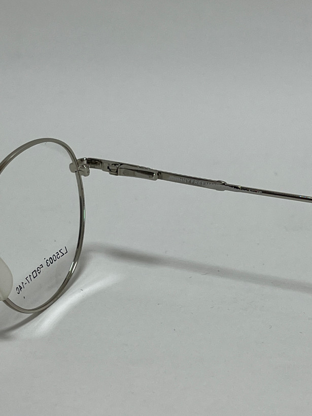 زاویه کناری فریم گرد فلزی عینک طبی جانی فریمن