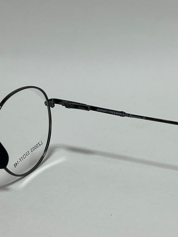 زاویه کناری فریم گرد فلزی عینک طبی جانی فریمن