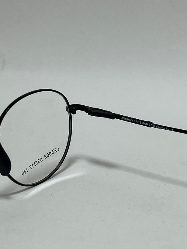زاویه کناری فریم گرد فلزی عینک طبی جانی فریمن