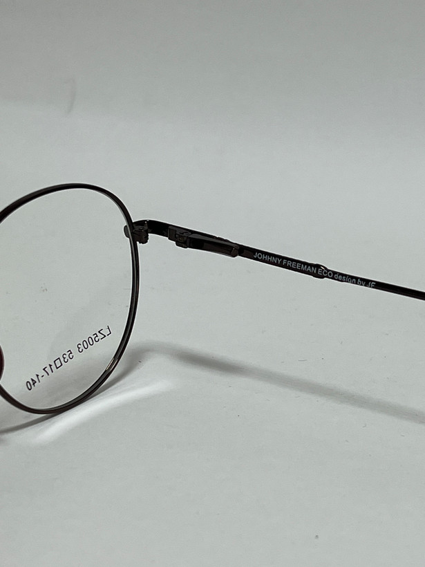 زاویه کناری فریم گرد فلزی عینک طبی جانی فریمن